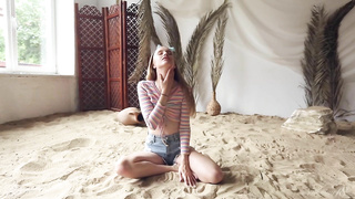 Stunning Obrey Lying On The Sand